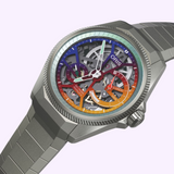 Oris Watches ProPilot X Gonzo Edition with a metallic bracelet and a vibrant, multi-colored skeleton dial featuring exposed gears and a prominent red-to-orange power reserve indicator.