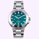 Oris Watches Yangtze Jiangtun Limited Edition stainless steel diving watch featuring a teal, wave-patterned dial and a rotating bezel.