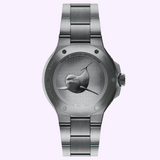 The stainless steel case back of an Oris Watches Yangtze Jiangtun Limited Edition watch, featuring an engraving of a porpoise and text including the limited edition name and serial number No. 0001/1849.