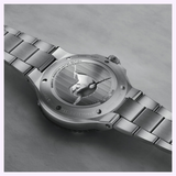 Stainless steel case back of the Oris Watches Yangtze Jiangtun Limited Edition featuring an engraved finless porpoise, with limited edition numbering and watch specifications inscribed around the perimeter.