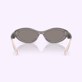 The PRADA Sunglasses 0PR 26ZS 20F80Q55 by Prada Sunglasses showcase a gray oval frame viewed from the back, with transparent arms carrying a subtle beige tint, all set against a light purple background—these sporty sunglasses capture the brand’s signature sophistication.