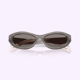 Prada Sunglasses 0PR 26ZS 20F80Q55 feature gray oval frames with dark lenses and clear, light-colored arms, showcased against a light lavender background to add a subtle sporty touch to your style.