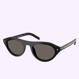 Prada Sunglasses 0PR B15SF 16K73152: black cat-eye frames with dark lenses and gold accents on the corners and temple arms, showcased on a light lavender background for a chic, sporty look.