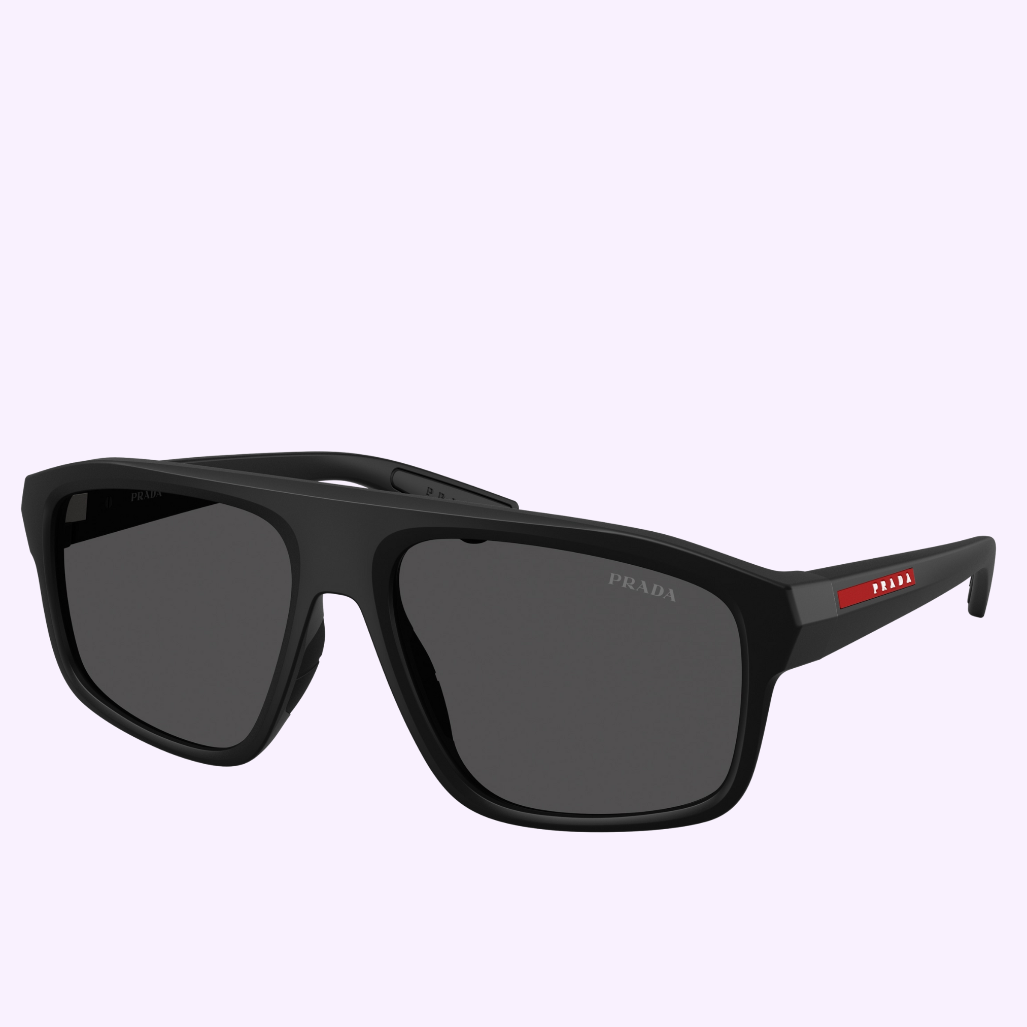 PRADA Linea Rossa Sunglasses 0PS B02S 1BO06F59 feature a black rectangular mask-shaped frame with dark lenses and a red Prada logo on the temple, shown against a pale purple background.