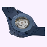 Close-up of the back of the Rado Watches Captain Cook High-Tech Ceramic Skeleton R32153209, showing its blue skeleton automatic movement through a transparent case with "RADO," "SWISS MADE," and "30 bar (300m)" visible.