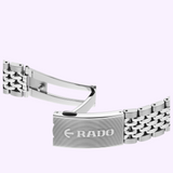 A metallic Rado Watches Captain Cook R32223313 watch bracelet with an open butterfly deployment clasp featuring an engraved logo.