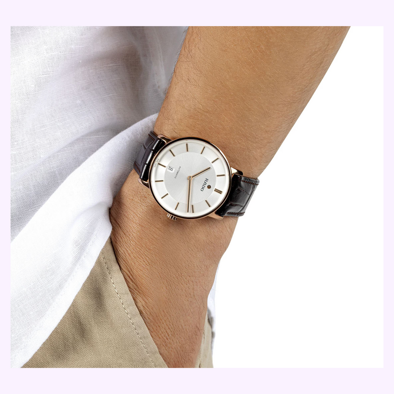 Rado DiaMaster Thinline Automatic R14068036 worn on the wrist with a white shirt and beige trousers
