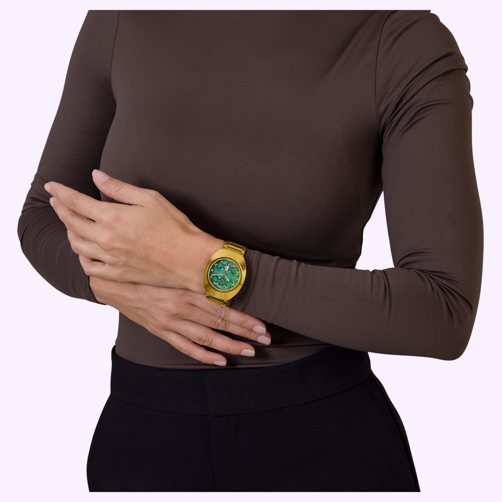 Rado DiaStar Original R12161313 worn on the wrist showing the textured green dial