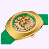 Gold-tone Rado Watches DiaStar Original Skeleton Limited Edition R12166309 watch featuring an oval case, a skeletonized dial with a bright green inner bezel, and a green rubber strap.