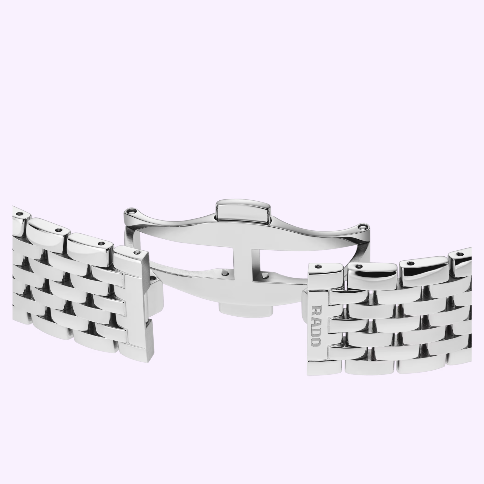 A silver stainless steel clasp, partially open with a woven pattern and RADO engraved, is set against a pale lavender background—ideal for the Rado Watches Florence Diamonds R48912733 from Rado Watches.