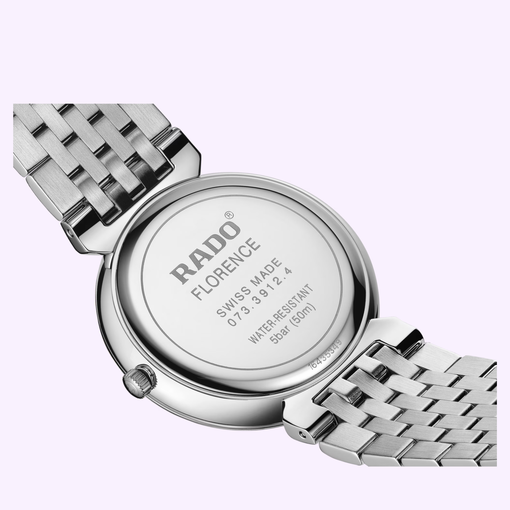 Close-up of the back of a stainless steel Rado Watches Florence Diamonds R48912733 wristwatch, featuring a metal link band. The caseback displays branding, model details, SWISS MADE engraving, and info on quartz movement and water resistance.