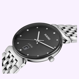 A close-up of the Rado Watches Florence Diamonds R48912733, featuring a stainless steel case, black dial with silver markers, date window at 6 o'clock, metal link band, and precision quartz movement.