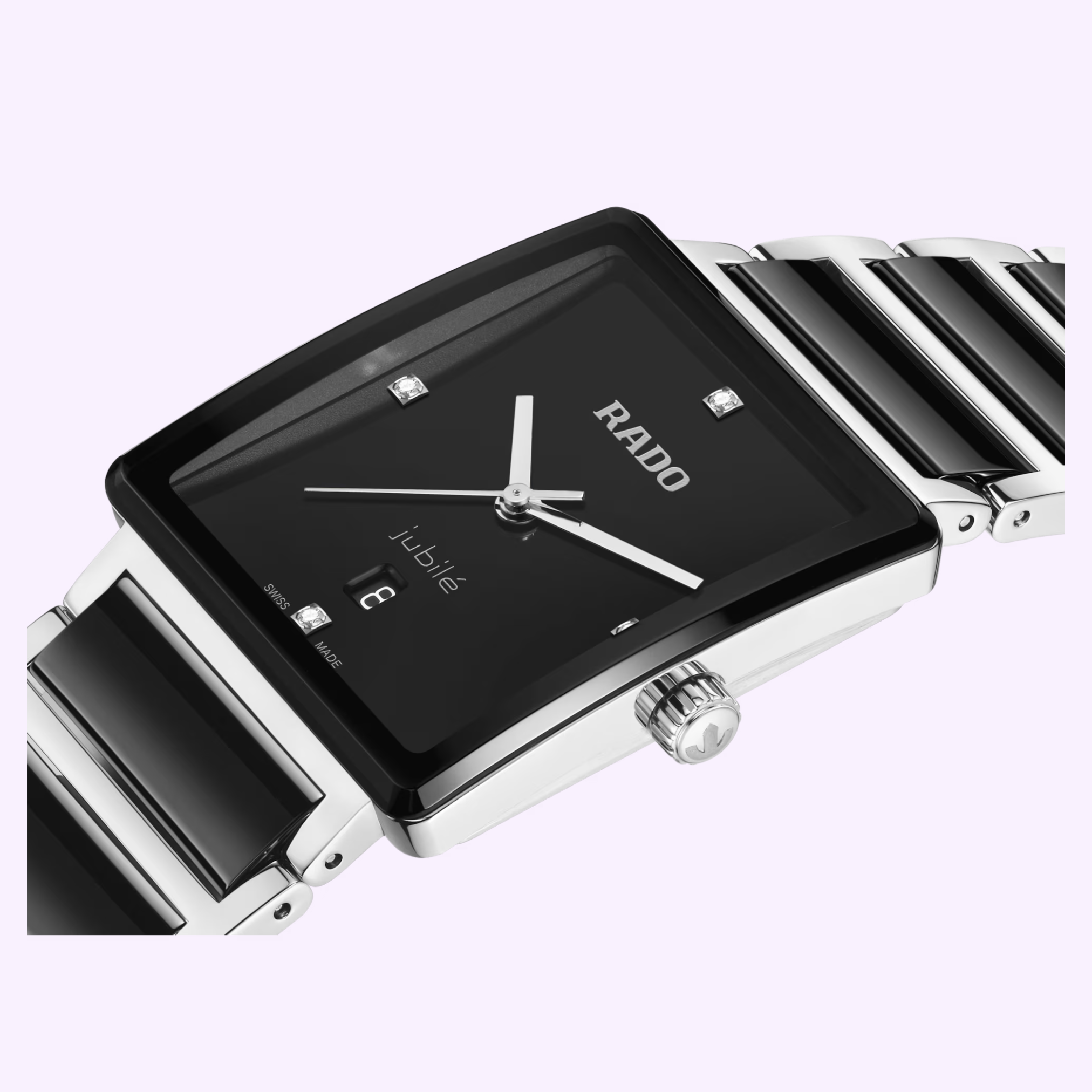 A close-up of the Rado Watches Integral Diamonds R20255712 features a rectangular silver and black case, minimalist black dial with silver hands, four diamond hour markers, and a matching metal link band by Rado Watches.