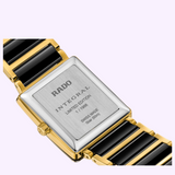 The back of a Rado Watches Integral Limited Edition R20254702 watch with black and gold links, featuring engraved text that includes Integral, Limited Edition, and Swiss Made.