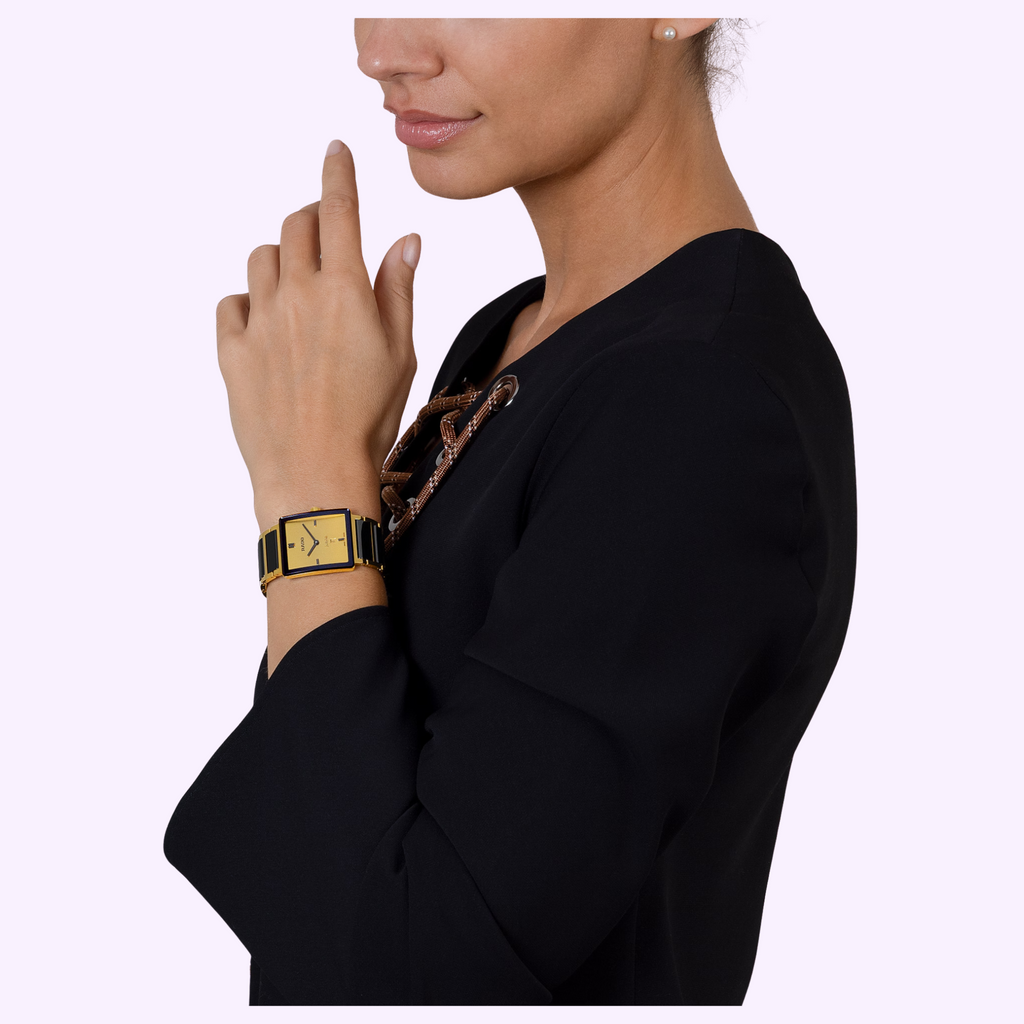 Woman wearing the Rado Integral Limited Edition R20254702 gold and black ceramic watch