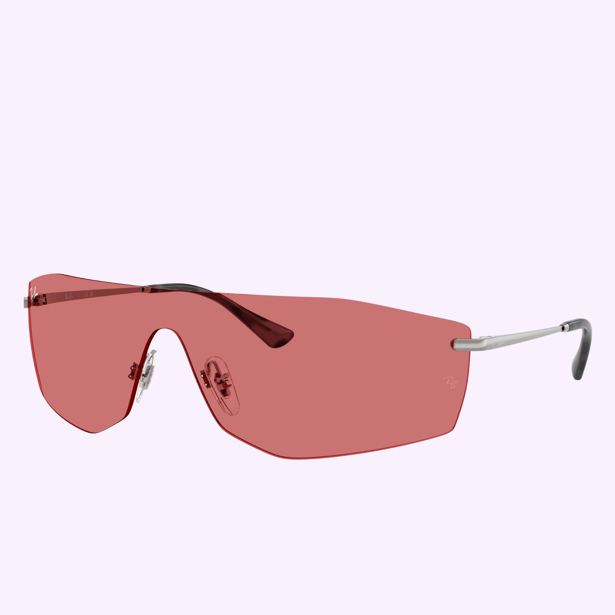 Ray-Ban Sunglasses 0RB3781 004/7541 feature a single angular red lens and thin silver arms, set against a light purple background.
