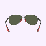 Ray-ban 0RB8313M F00871 61 Unisex Sunglasses by Ray-Ban Sunglasses, featuring dark green lenses, black frames, and red nose pads and temple tips on a light purple background.