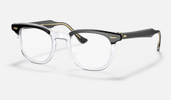 The Ray-Ban Optical 0RX5398 2034 features unisex square frames with clear lenses, a black upper frame and temples, transparent lower rims, and gold hinge accents—classic style inspired by the original design.