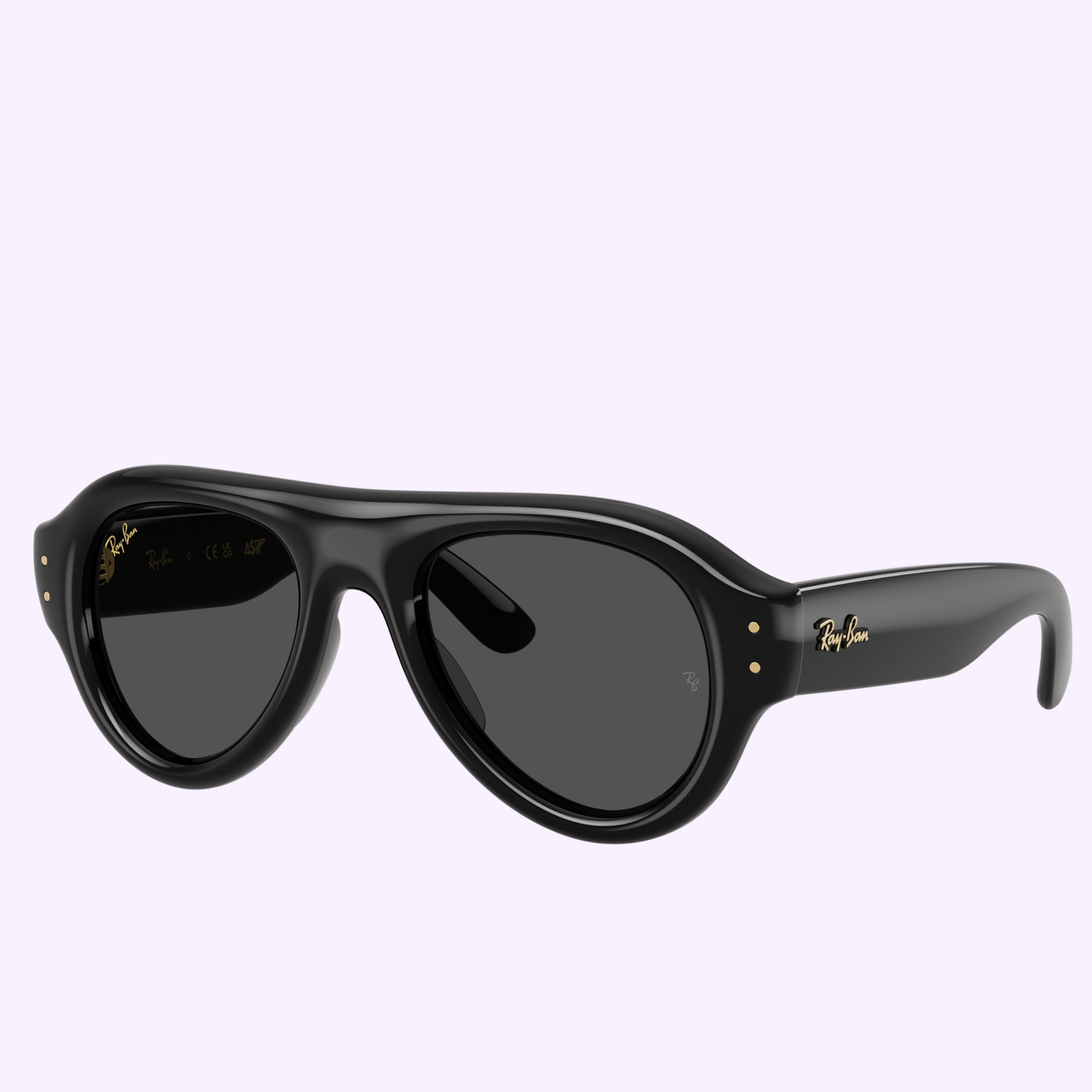 Black, glossy Ray-Ban Sunglasses 0RB4925 601/8752 with dark lenses and gold logo on the arms, shown at an angle on a light purple background.