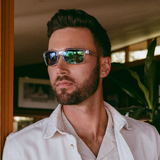 Revo RE 1027 09 GNP Crawler Crystal Evergreen Photo Man Sunglasses