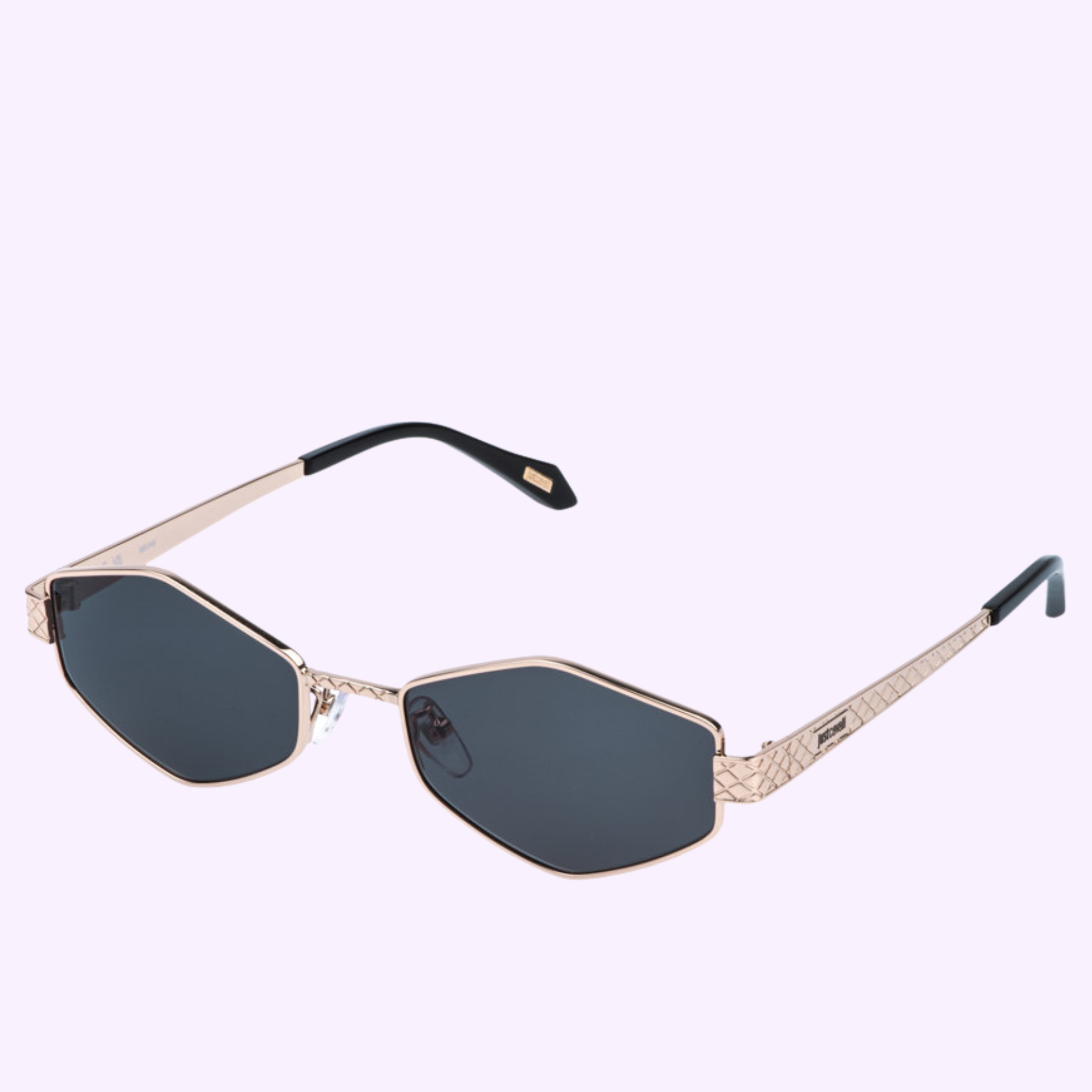 Roberto Cavalli Sunglasses SJC180 550300 feature gold geometric frames, black lenses, and textured arms. Black temple tips with gold accents showcase this luxury brand, displayed on a light purple background.