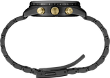 Side view of the Seiko Luxe Watches 100th Anniversary SPEEDTIMER Limited Edition SSH169, featuring a black metal segmented band, two gold buttons, a gold crown, and numbered bezel. The band is open and flat beneath the face.