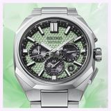 Seiko King Watches Astron HAB005 featuring a silver-toned finish, textured light green dial, three black subdials, and a stainless steel link bracelet.