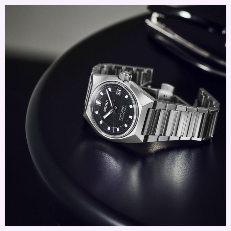 King Seiko HKF005 Faceted Indices Close-Up King Seiko VANAC HKF005 resting on a black table showing black dial and faceted indices