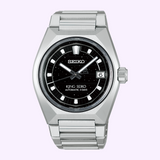 Silver-tone Seiko King Watches King Seiko VANAC HKF005 wristwatch with a black dial, date display, and linked metal bracelet.