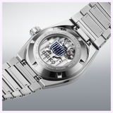 A close-up of the back of the Seiko Luxe Watches King VANAC HKF004 Limited Edition, featuring a metal band and showcasing its inner mechanical movement through a transparent case back—created to celebrate Seiko's 145th Anniversary.