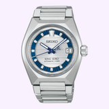Introducing the Seiko King Watches VANAC HKF004 Limited Edition by Seiko Luxe Watches—a striking silver wristwatch featuring a metallic band, blue and silver dial, bold blue hour markers, and a date window positioned at 3 o’clock. The watch face is inscribed with SEIKO and KING SEIKO AUTOMATIC 3 DAYS. Inspired by the legendary King Seiko VANAC collection, this limited edition timepiece seamlessly fuses classic heritage elements with contemporary elegance.