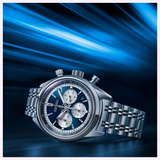 The Seiko Luxe Watches Speedtimer SRQ051 by Seiko Luxe Watches, featuring a blue and silver dial with three sub-dials, a metal band, and powered by the precise Caliber 8R48 movement, is displayed against a dynamic blue streaked background.