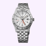 Displayed against a light purple background is the Seiko Watches 5 Sports SSK059 by Seiko Watches, featuring a silver metal band, white dial with black hour markers, a red GMT hand, and a date window at 3 o’clock—an eye-catching GMT timepiece from the Field Series.