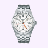 The Seiko Watches 5 Sports SSK059 is a stainless steel wristwatch from Seiko Watches, featuring a white dial, bold black hour markers, a date display at 3 o’clock, and a striking red GMT hand. Designed with a silver metal bracelet and a 24-hour bezel, this GMT timepiece from the Field Series is perfect for adventure seekers.