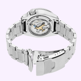 A close-up of a Seiko Watches 5 Sports X Rowing Blazers SRPM19 Limited Edition wristwatch with an open clasp, revealing the transparent case back and intricate internal mechanical movement. This exclusive model by Seiko Watches showcases meticulous craftsmanship and unique design elements from the Rowing Blazers collaboration.
