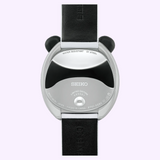 The back of a Seiko Watches Power Design Project HHK001 Panda chronograph, featuring black leather straps, decorative panda ears on the case, and an engraving of Limited Edition 000001.