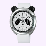 A white Seiko Watches Power Design Project HHK001 Panda chronograph watch featuring a panda face dial and black panda ear attachments on the top of the bezel.