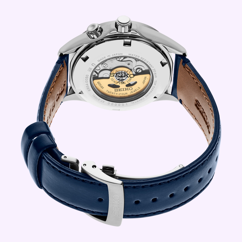 Seiko Prospex Alpinist GMT SPB377 blue leather strap showing exhibition caseback with gold-tone rotor
