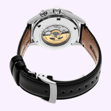 A Seiko Luxe Watches Prospex Alpinist GMT SPB379 wristwatch displayed from the back, highlighting its transparent case, automatic movement, and brown leather strap with a black buckle—a refined mechanical sports watch crafted for the discerning adventurer.