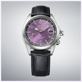 The Seiko Watches Prospex HBC006 145th Anniversary Limited Edition by Seiko Watches showcases a captivating purple dial, paired with a black leather strap, sleek silver case, date window at 3 o’clock, and refined silver hour markers—all presented against a light gradient background.