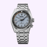 Seiko Watches Prospex Speedtimer HBC003 automatic watch in silver stainless steel with a textured light blue dial, orange accents, and a metal link bracelet.