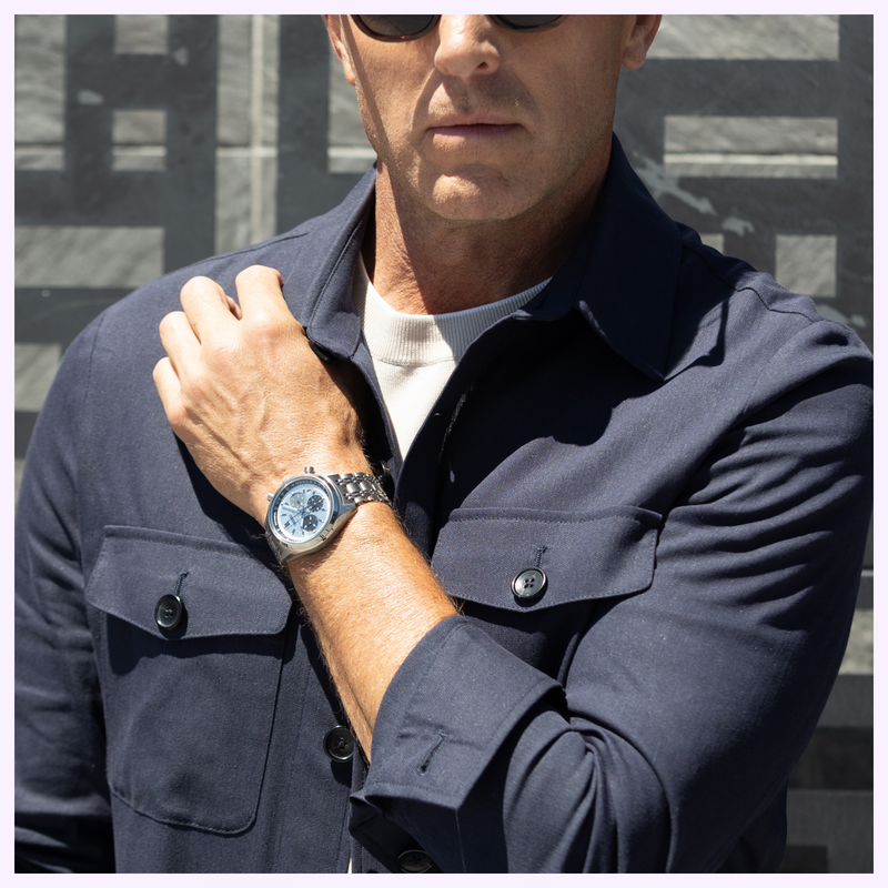 Seiko HBD001 Wrist Shot Man wearing the Seiko Prospex Speedtimer HBD001 chronograph with blue dial and stainless steel bracelet on his wrist
