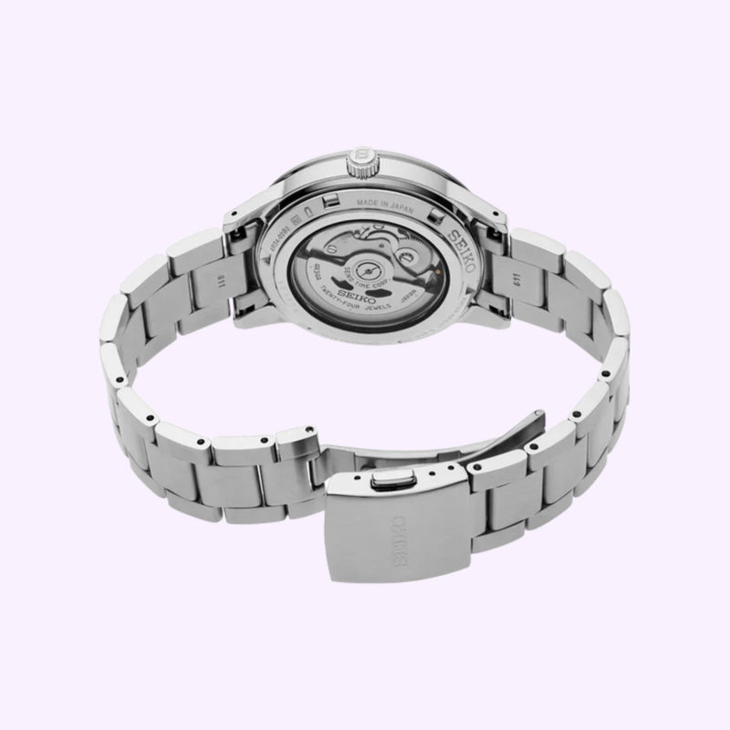 Seiko Presage Style60's SSK009 wristwatch shown from the back, with an open clasp, highlighting the transparent screw-down caseback and visible automatic movement