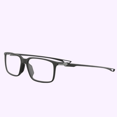 A pair of modern, rectangular black Tag Heuer Optical TH50028I 55005 eyeglasses with thin frames and curved temple arms, displayed on a light purple background by a Miami Authorized Dealer.