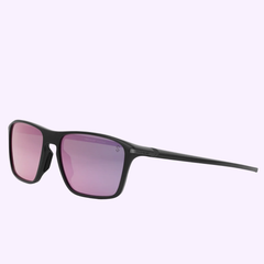 The Tag Heuer Sunglasses TH40017I 5705D feature black frames, rectangular lenses, and a pink-purple reflective tint—ideal for Miami style. Displayed on a light purple background. Buy confidently from an Authorized Dealer.