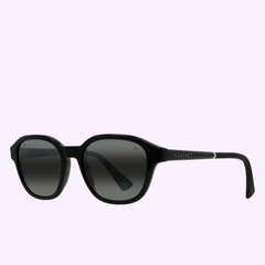 Tag Heuer Sunglasses VU40058I 5401C by Tag Heuer Optical, featuring black round frames and dark lenses with a glossy finish and distinctive branding on the temple, are showcased against a light purple background. Enjoy effortless Miami-inspired style with these standout shades from an Authorized Dealer.