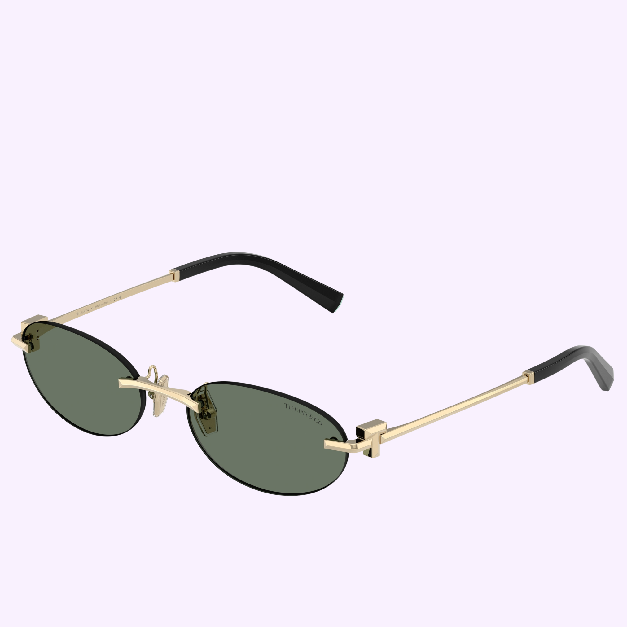 Tiffany & Co. Sunglasses 0TF3119D 62388256 feature gold oval frames, dark green lenses, and black temple tips, shown on a light purple background. Shop authentic Tiffany & Co. Sunglasses from a Miami authorized dealer.