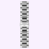 A stainless steel bracelet with a polished and brushed finish, crafted to enhance the elegance of the Tissot Watches Chrono L 42mm T1164171109200, features a clasp engraved with TISSOT 1853 and is shown vertically against a light purple background.