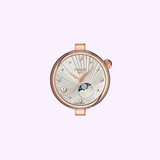 Tissot Watches Desir 29.6mm T1522232203600 rose gold watch featuring a textured white dial, moon phase display, date window, and small diamond hour markers.