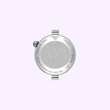Case back of a Tissot Watches Desir T1522231103600 stainless steel wristwatch with a brushed metal finish and a blue crown, engraved with the brand name and water resistance details.